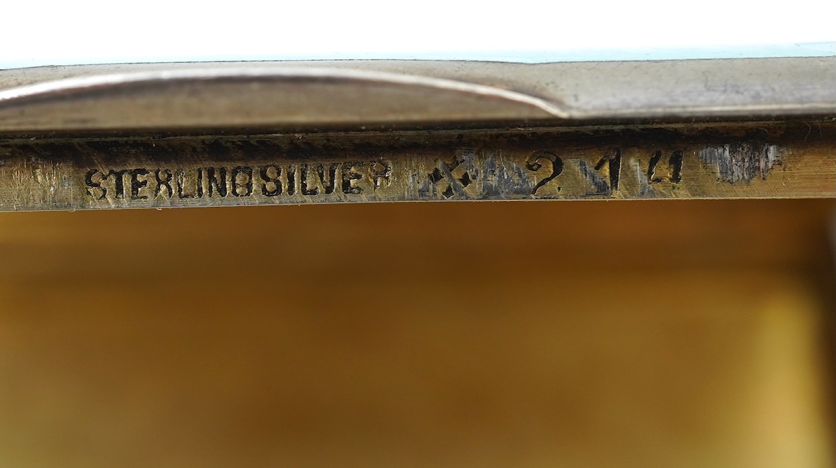 An early 20th century Viennese sterling and blue enamel combination cigarette/vesta case, inscribed Carl Heiss Wien Graben 11